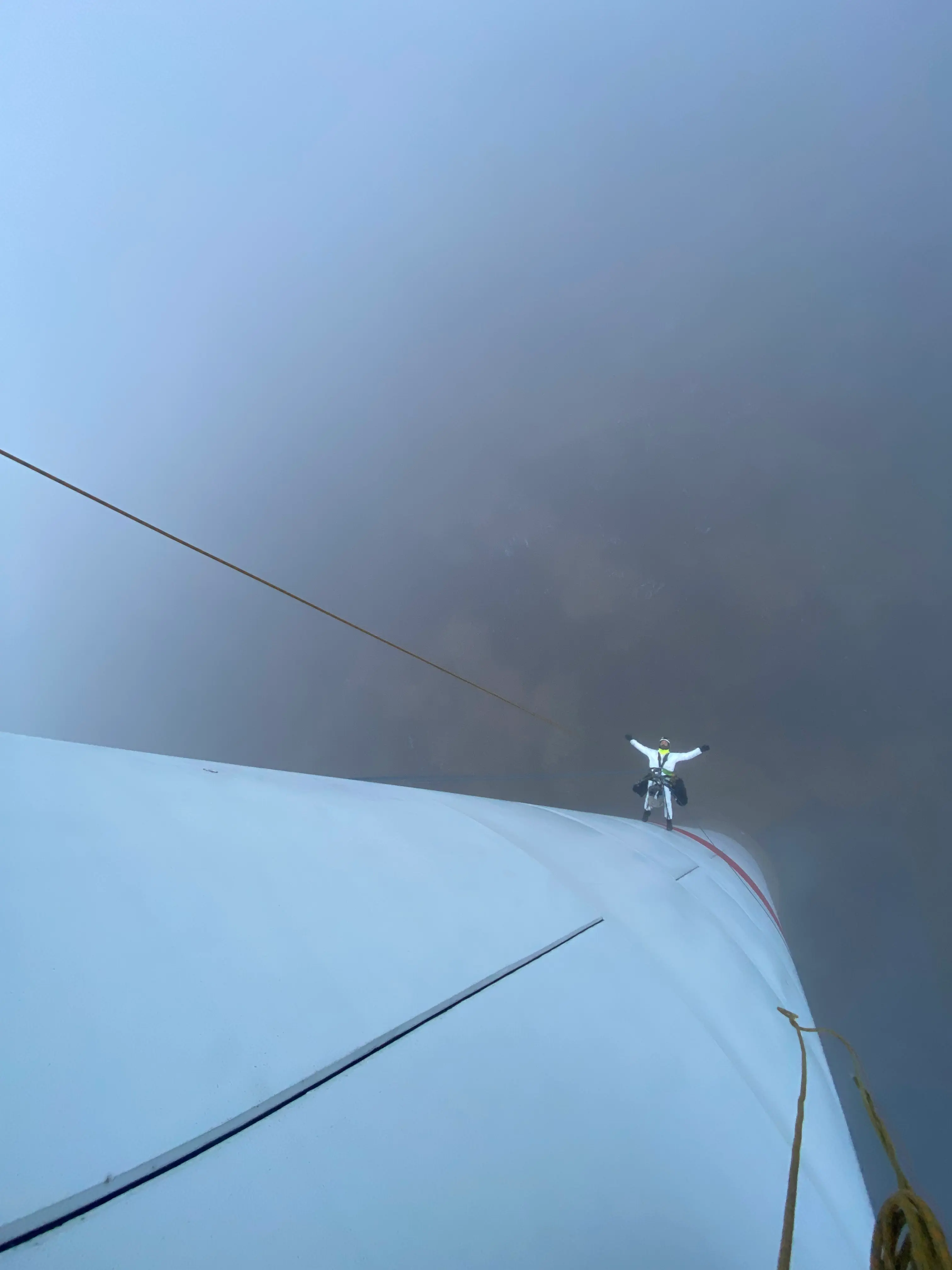 Rope access team working on wind turbine